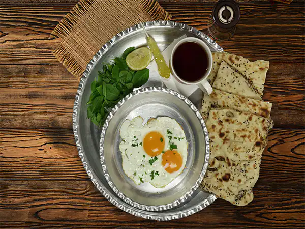 تعبیر خواب نیمرو خوردن + برای زن متاهل و باردار و دختر مجرد