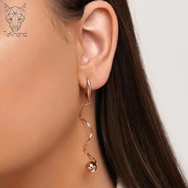مدل گوشواره اویز توپی + زیباترین مدل های گوشواره اویز توپی ترند امسال