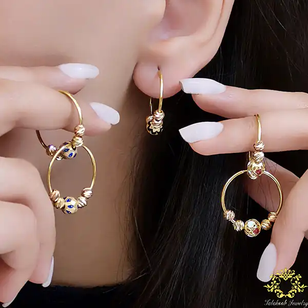 مدل گوشواره اویز توپی + زیباترین مدل های گوشواره اویز توپی ترند امسال