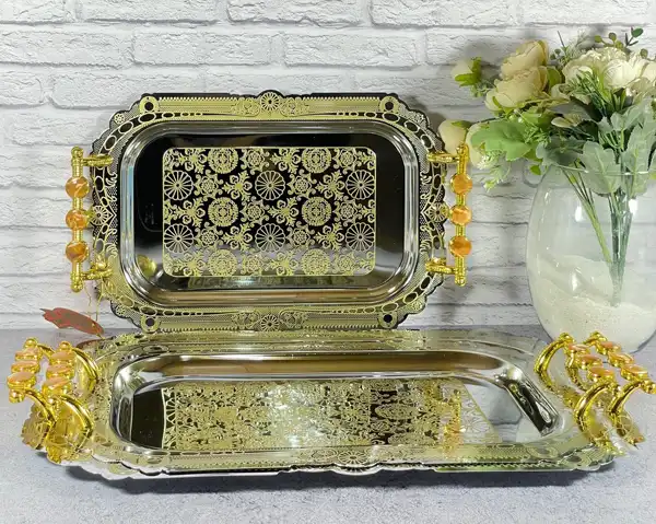 مدل سینی استیل جدید + سینی استیل پذیرایی یکی از ابزارهای کلیدی در هر آشپزخانه مدرن و حرفه‌ای است که میتونید انواع مدرن و ترند آن را اینجا ببینید