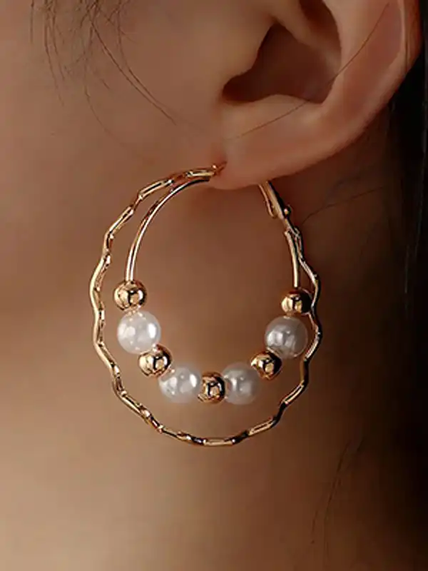 مدل گوشواره با مروارید + درخشش و جلوه‌ خاص چهره شما با مدل گوشواره با مروارید