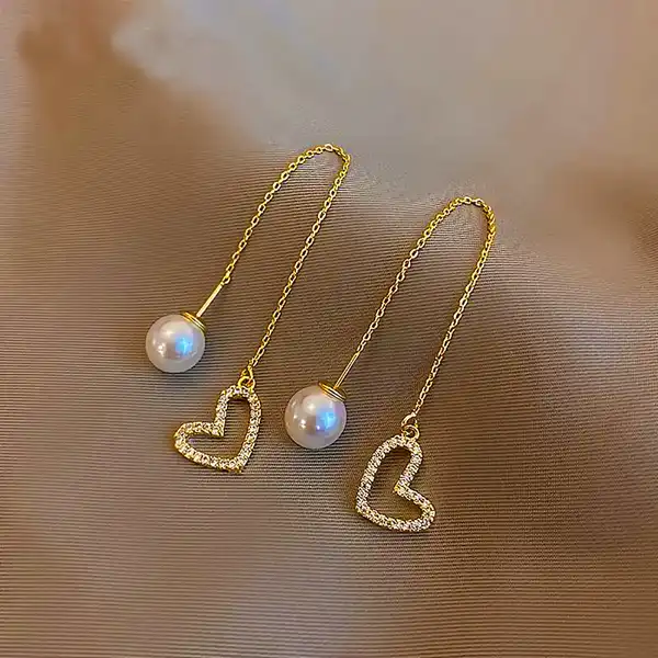 مدل گوشواره با مروارید + درخشش و جلوه‌ خاص چهره شما با مدل گوشواره با مروارید